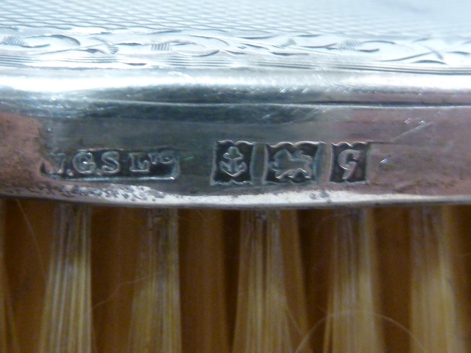 A silver mounted dressing table set, engine turned decoration within a tooled foliate band, - Image 5 of 5