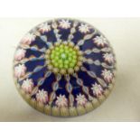 Perthshire- a glass paperweight, concentric millifiore canes interspersed with candy twist canes,
