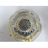 Whitefriars - a glass paperweight, concentric millifiori window cut, 1972, 7.5cm diam