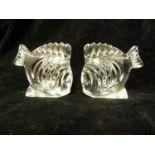 Baccarat - a pair of Art Deco style stylised glass fish paperweights, of puffer fish type cut glass,