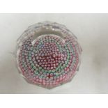 Whitefriars - a glass paperweight, concentric millifiori, diamond cut, date cane for 1976, 7cm diam