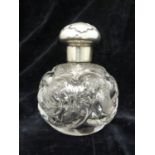 Thomas Webb or Stevens & Williams - a rock crystal silver mounted globular perfume bottle,