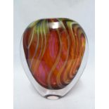 David Flower - an Autumn glass vase, of flattened ovoid form, the vase striped in orange, fuchsia,
