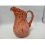 Possibly Loetz - an heliotrope Astglas jug, mauve/red flecks over an opalescent ground, 16cm high