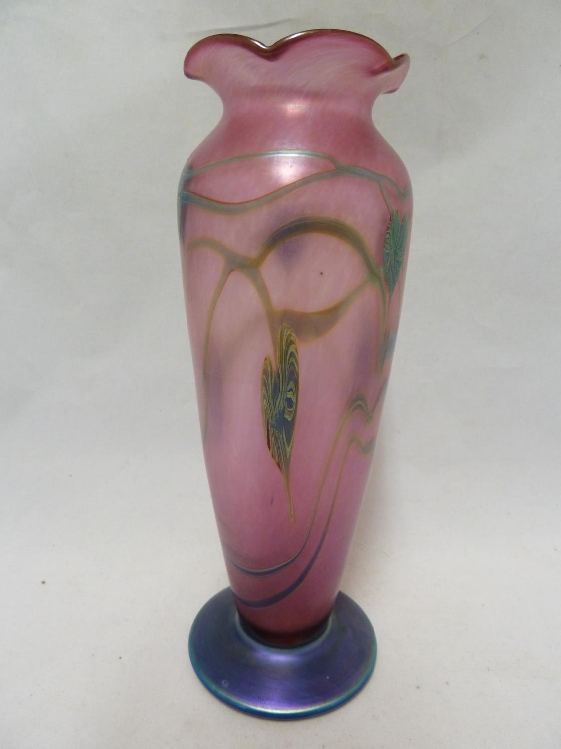 Okra - a glass vase, of pink bullet shaped body with frilled rim and circular blue glass foot, the - Image 2 of 6