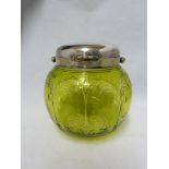 Stevens & Williams - an intaglio cut green on colourless glass biscuit barrel, cut with tassel and