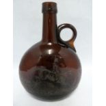 A P Haag, engraver - a 19th Century brown glass finger loop bottle decanter, engraved with a hunting