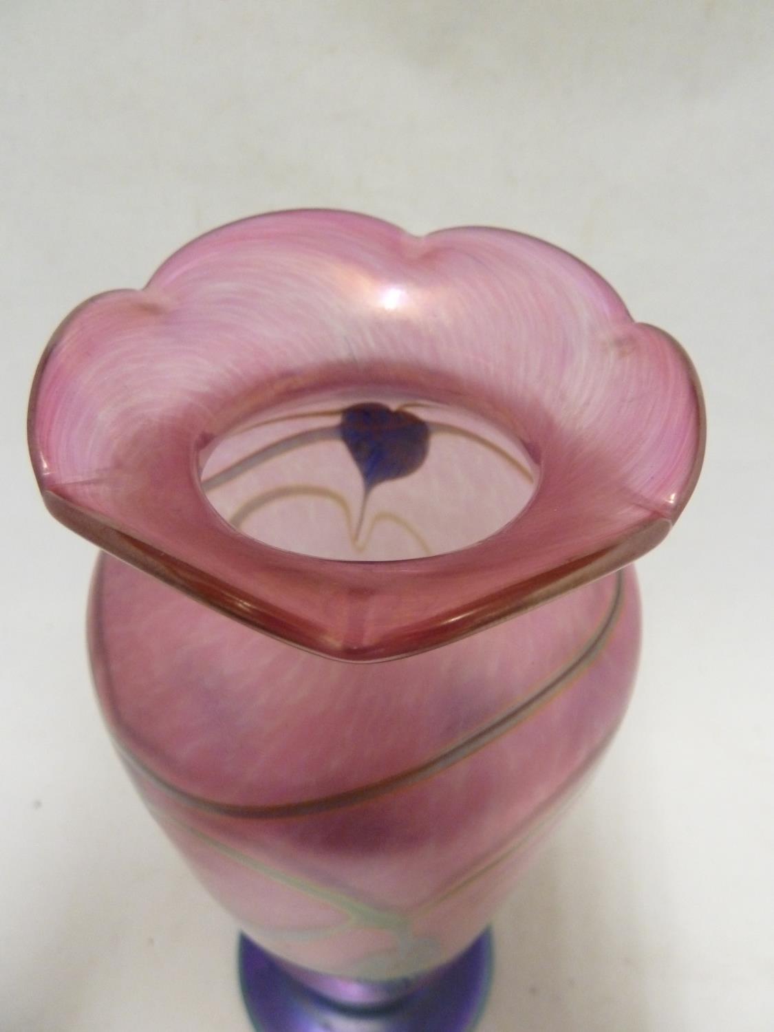 Okra - a glass vase, of pink bullet shaped body with frilled rim and circular blue glass foot, the - Image 4 of 6