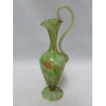 Venetian Glass - a high handled glass jug, after the antique, green colour with copper aventurine