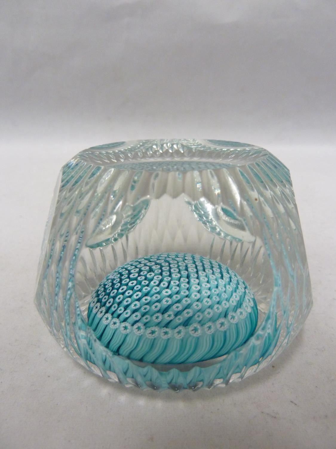 Whitefriars - a glass paperweight, concentric aqua millifiori canes, dish cut, with bark effect,