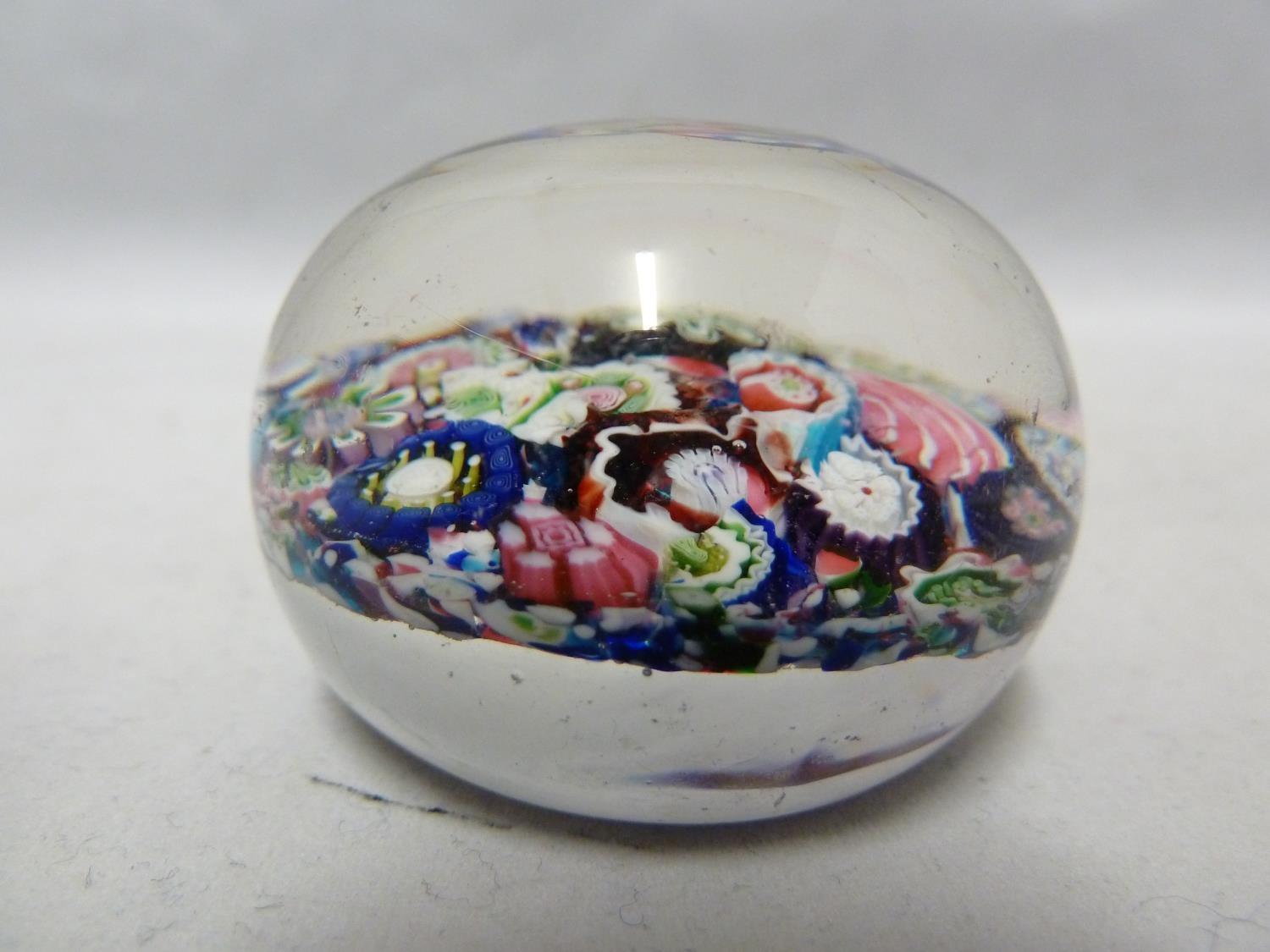Clichy - a glass paperweight, close packed millifiori canes, 4.5cm diam - Image 2 of 4