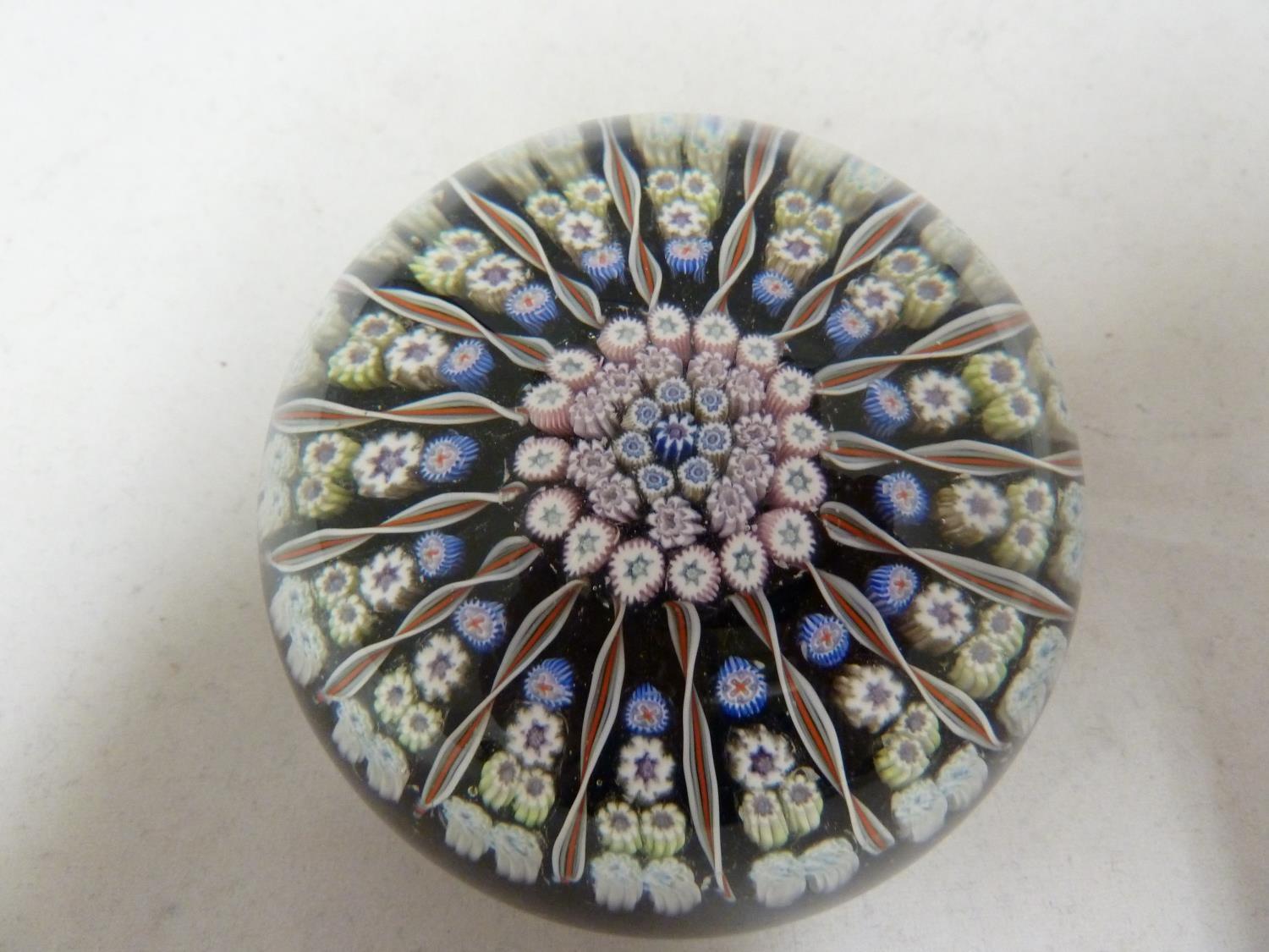 Perthshire - a glass paperweight, concentric millifiore canes, interspersed with candy twist