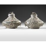 A PAIR OF OTTOMAN SILVER REPOUSSÉ LIDDED BOXES