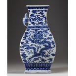A CHINESE BLUE AND WHITE 'DRAGON & PHOENIX' VASE