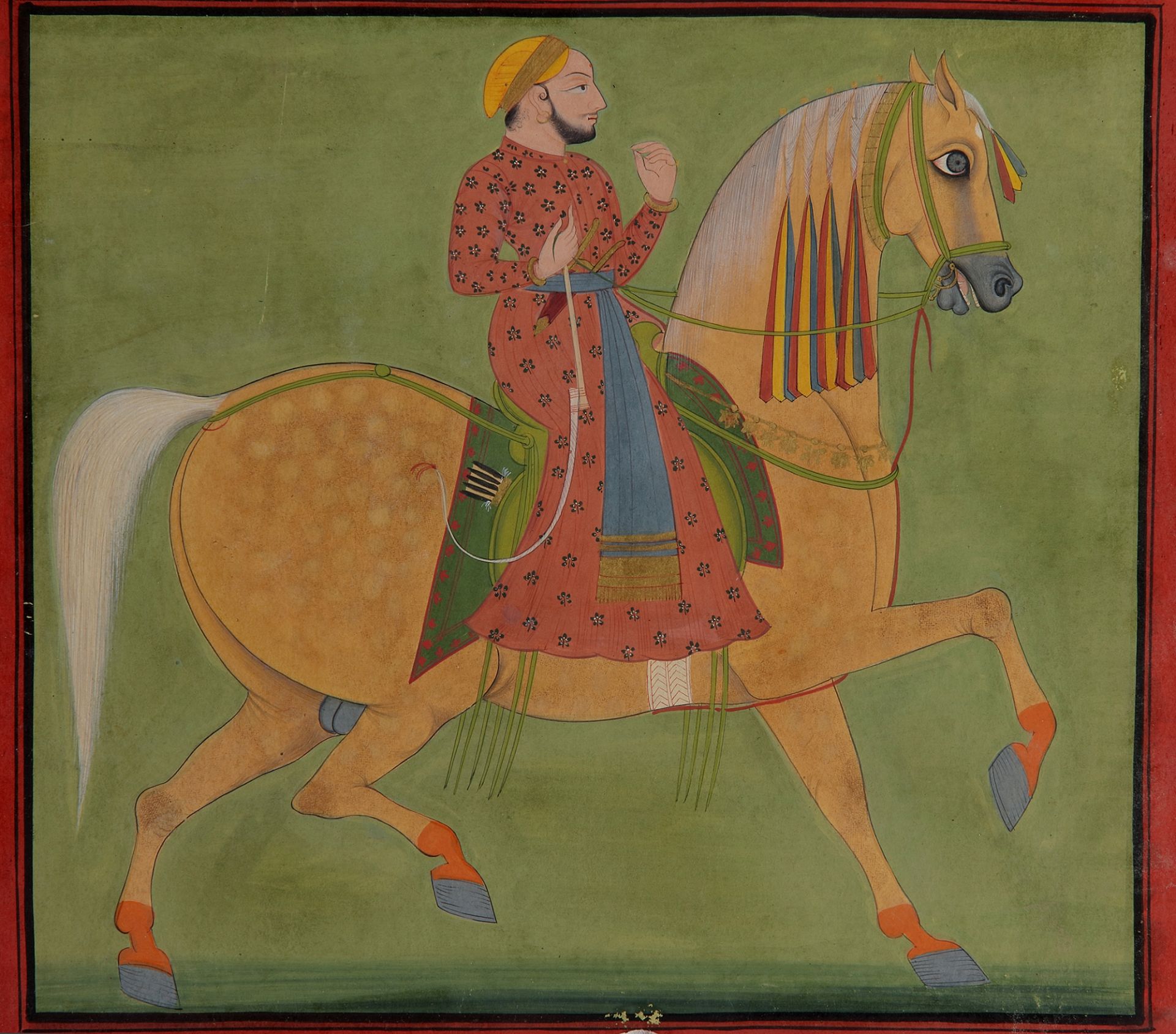 AN INDIAN MINIATURE DEPICTING A MAN ON A HORSE