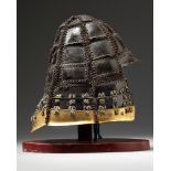 A JAPANESE WARRIOR HELMET (KABUTO) CONSISTING OF BLACK LACQUERED METAL PLATES