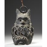 A JAPANESE CAST IRON HANGING LAMP IN THE SHAPE OF A HOMED OWL (MIMIZUKU)