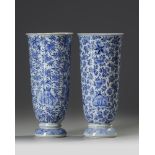 A PAIR OF CHINESE BLUE AND WHITE BEAKER VASES