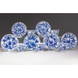 SIX CHINESE BLUE AND WHITE SAUCERS AND FIVE CUPS