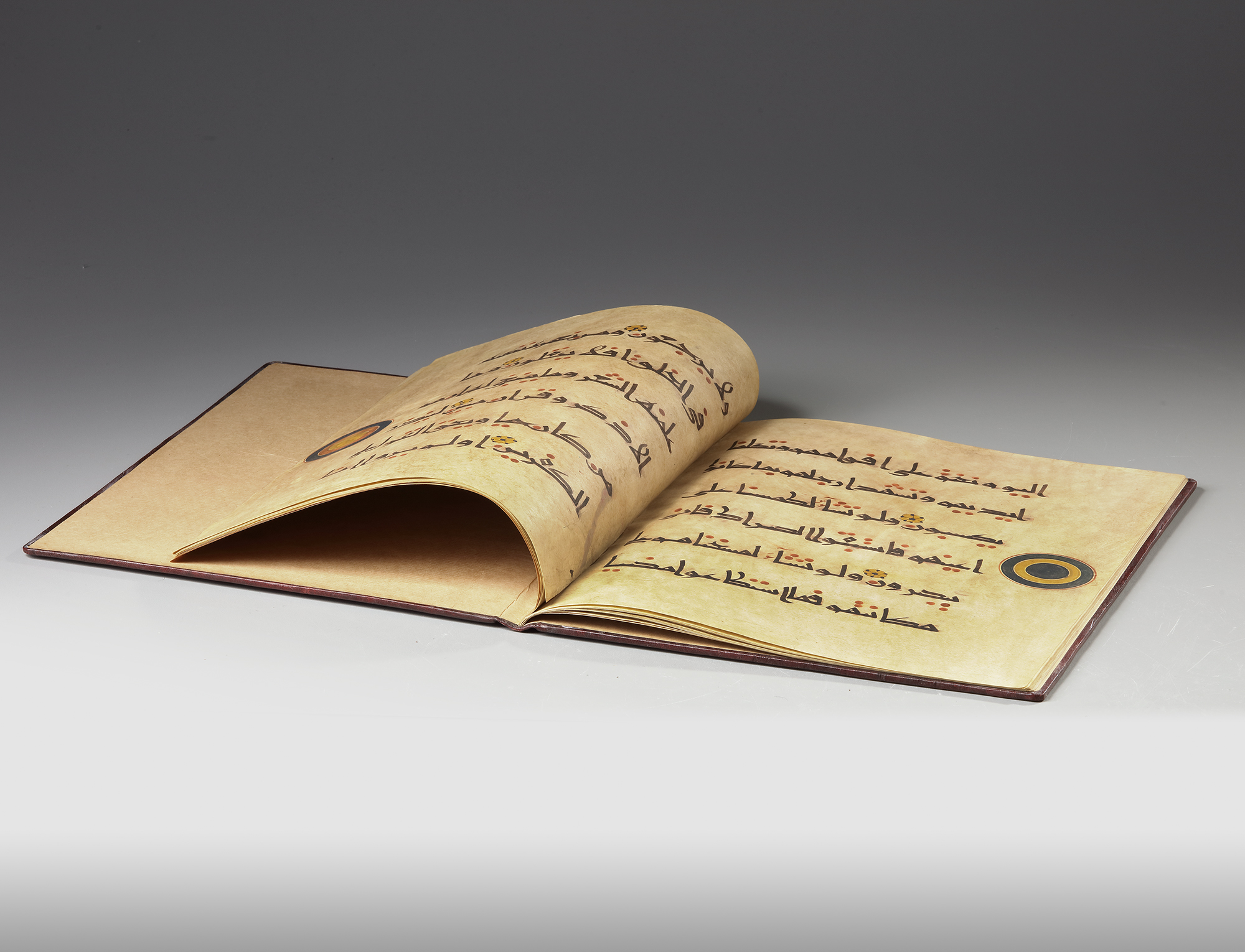 A LEATHER-BOUND BOOK WITH ISLAMIC TRANSCRIPTS - Image 2 of 3