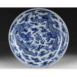 A CHINESE BLUE AND WHITE 'DRAGON' DISH