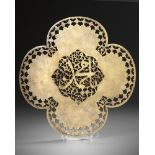 AN ELEGANT SAFAVID PIERCED STEEL QUATREFOIL PANEL