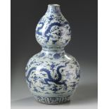 A CHINESE BLUE AND WHITE DOUBLE GOURD VASE