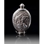 A TIBETAN SILVER-MOUNTED JADE SNUFF BOTTLE