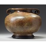 A JAPANESE BROWN BRONZE FLATTENED GLOBULAR VASE