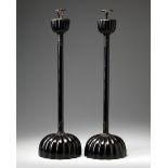 A PAIR OF LACQURED BUDDHIST TEMPLE CANDLE HOLDERS