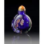 A LARGE CHINESE BLUE-GROUND COLOURED GLASS SNUFF BOTTLE