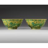 A PAIR OF CHINESE YELLOW-GROUND GREEN-ENAMELED 'DRAGON AND PHOENIX' BOWLS