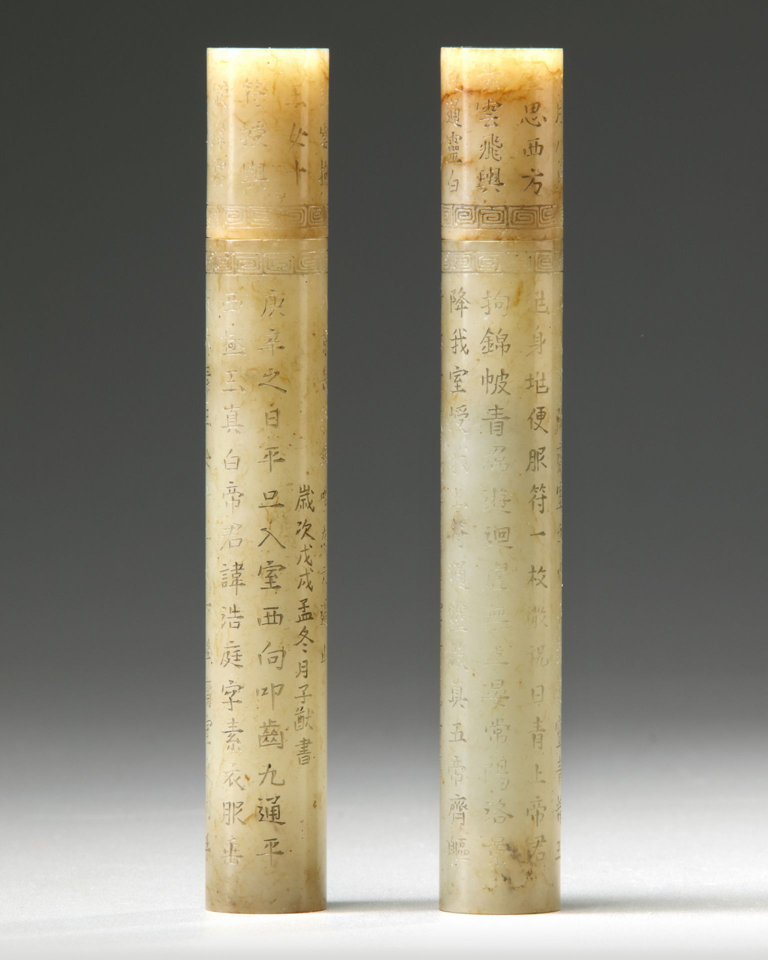 A PAIR OF CHINESE JADE CARVED JOSS STICK HOLDERS AND COVERS