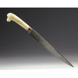 AN INDIAN MUGHAL JADE HILTED GOAT HEADED DAGGER