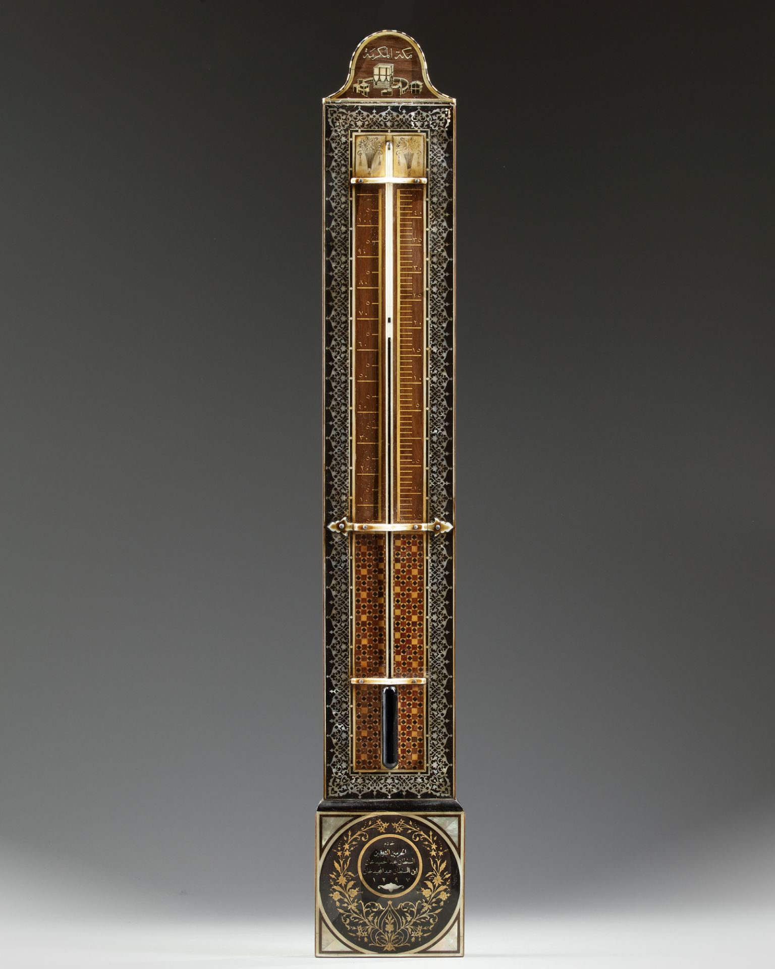 A WOODEN MOTHER-OF-PEARL AND IVORY INLAID BAROMETER