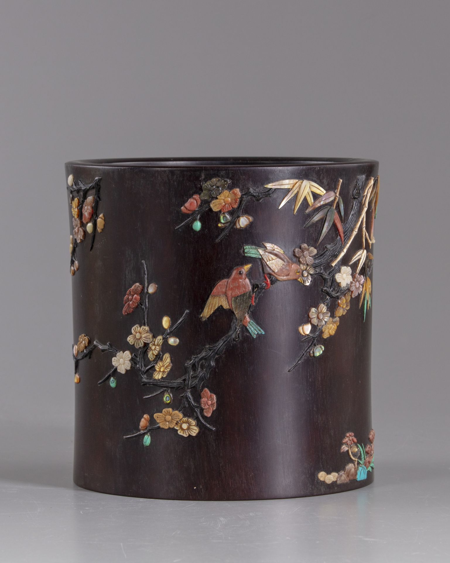 A CHINESE HARDWOOD SOAPSTONE AND MOTHER-OF-PEARL INLAID BRUSH POT