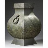 A LARGE JAPANESE FOUR SIDED GREEN BRONZE VASE