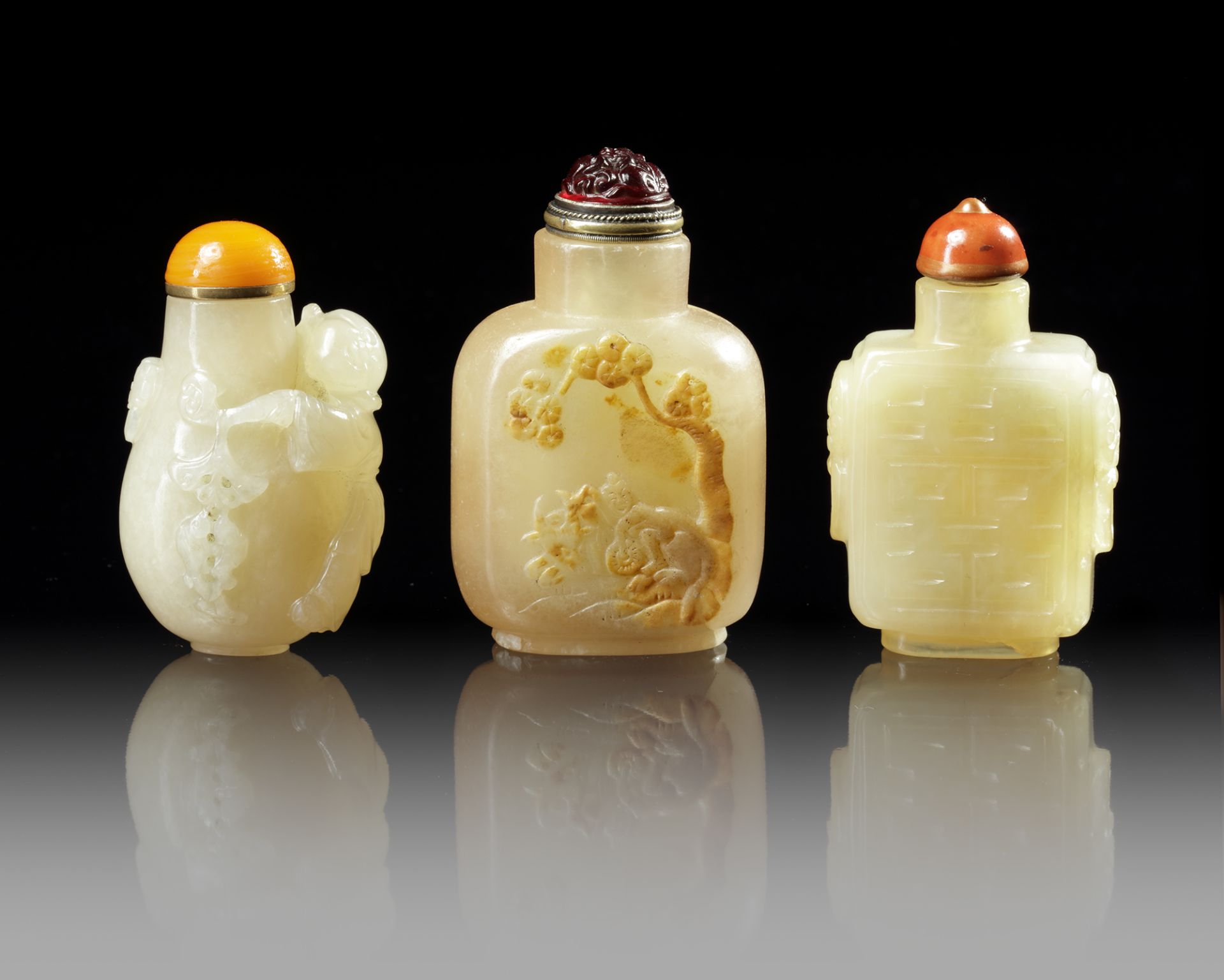 THREE CHINESE CELADON JADE SNUFF BOTTLES