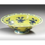 A RARE CHINESE MING-STYLE BLUE AND WHITE YELLOW-GROUND CONICAL BOWL