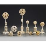 A GROUP OF CANTONESE CARVED PUZZLE BALLS AND STANDS