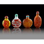FOUR CHINESE GLASS SNUFF BOTTLES