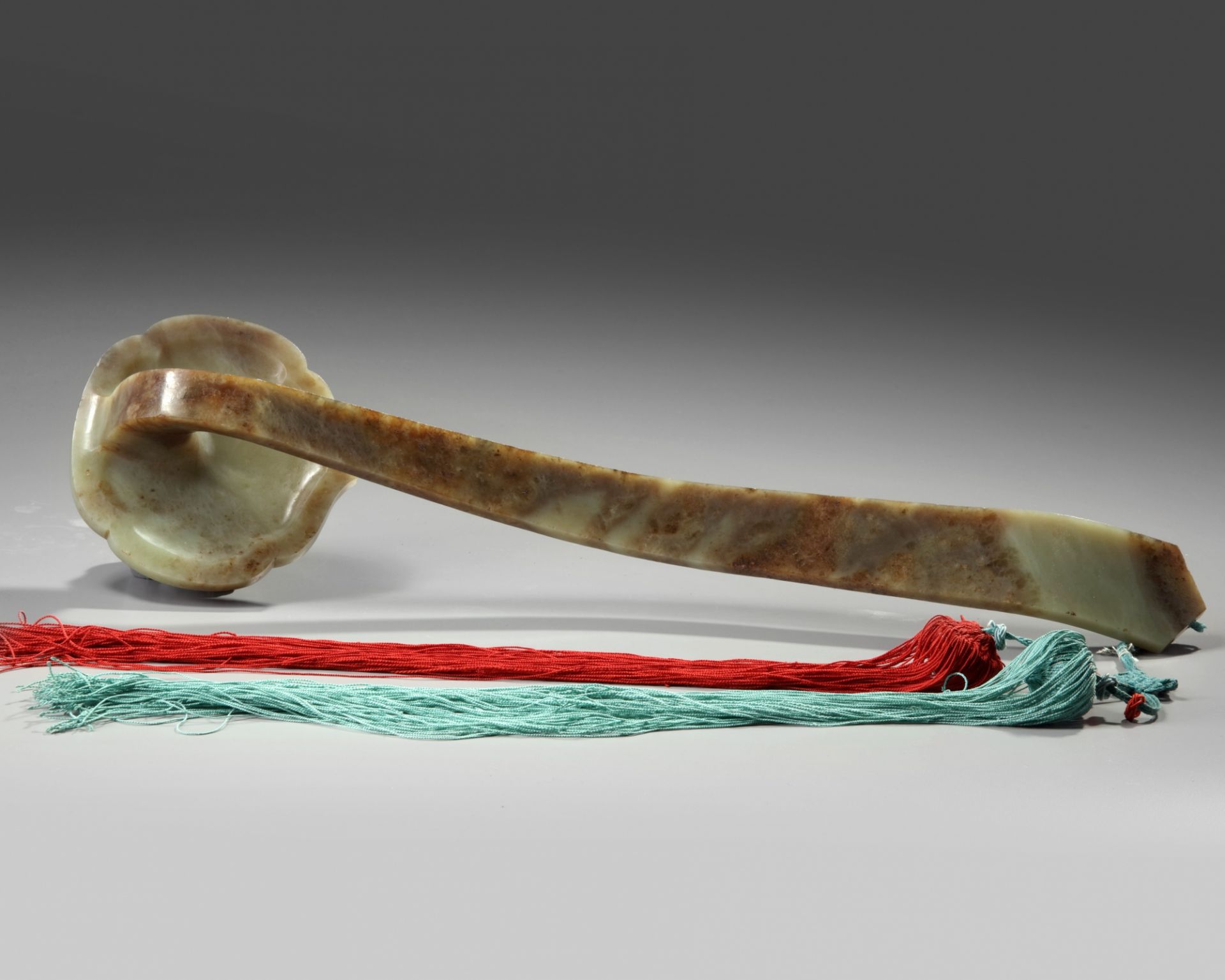 A LARGE CHINESE CELADON AND RUSSET JADE RUYI-SCEPTRE - Image 2 of 3