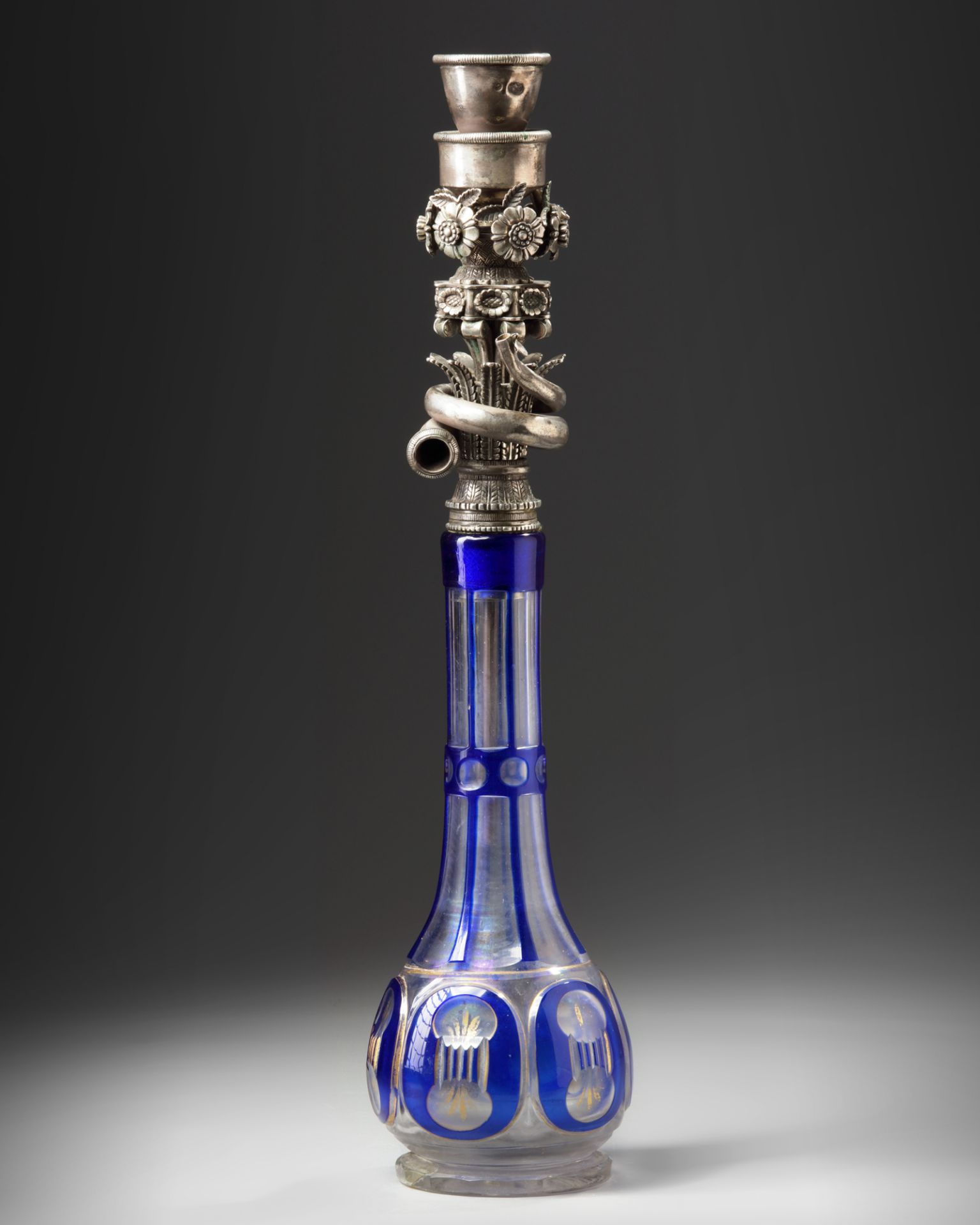 A BOHEMIAN CUT-GLASS HOOKAH BASE WITH OTTOMAN SILVER MOUNTS