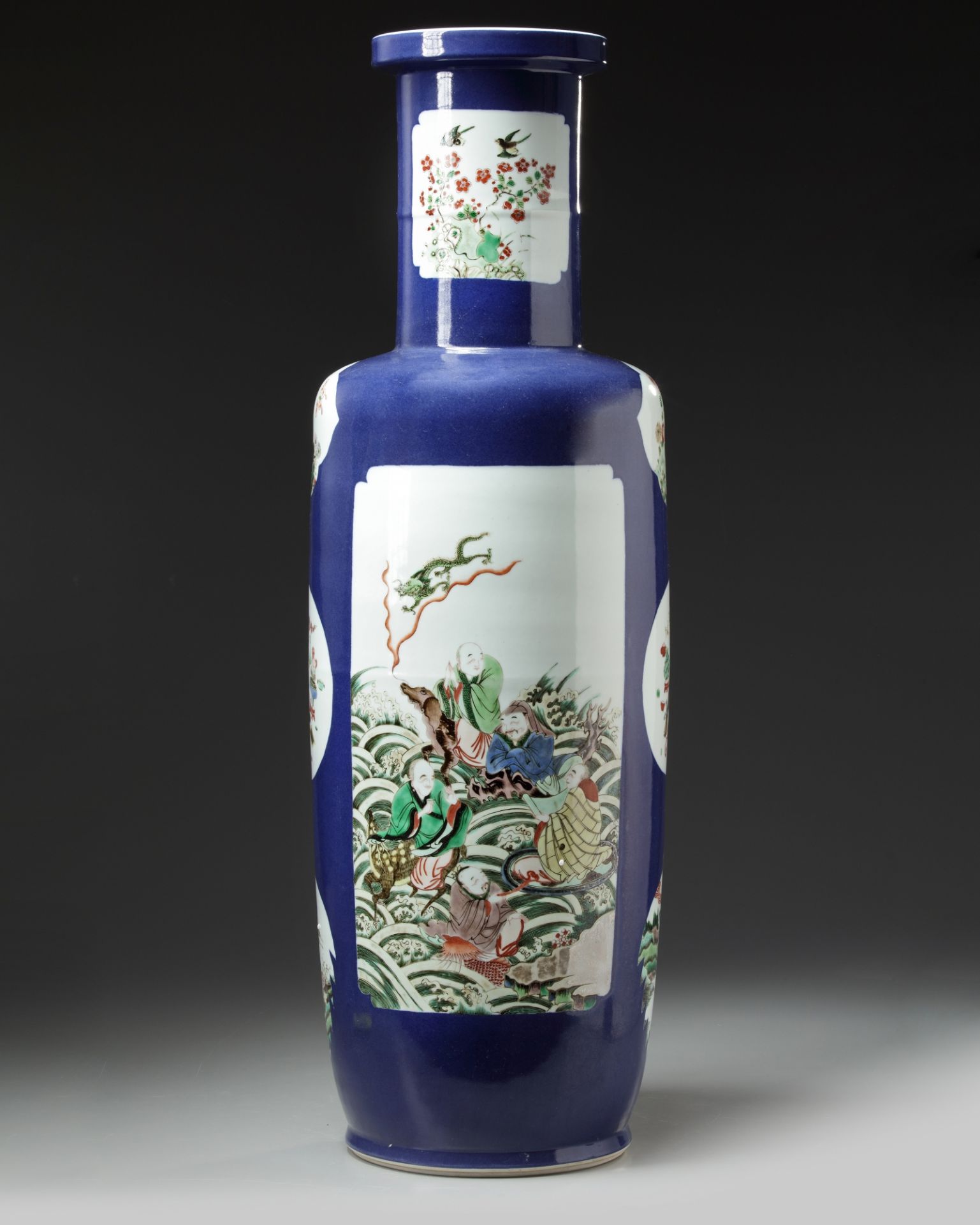 A LARGE CHINESE BLUE GROUND FAMILLE VERTE ROULEAU VASE