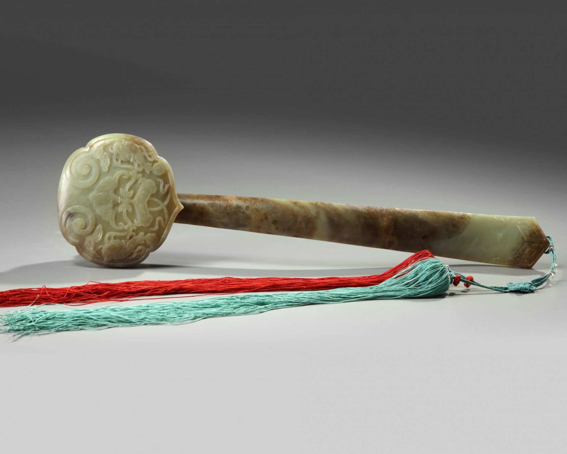 A LARGE CHINESE CELADON AND RUSSET JADE RUYI-SCEPTRE