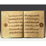 A LEATHER-BOUND BOOK WITH ISLAMIC TRANSCRIPTS