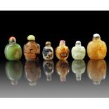 A GROUP OF SIX CHINESE HARDSTONE SNUFF BOTTLES