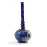 A BLUE GLASS SPRINKLER, PERSIA, 9TH-10TH CENTURY