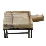 A SOUTH ARABIAN ALABASTER LIBATION TABLE, CIRCA 1ST CENTURY BC/AD