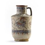 AN ISLAMIC MINAI'I GLAZED JUG, PERSIA, LATE 12TH CENTURY